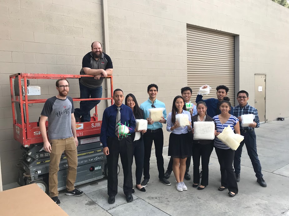 Students holding packages
